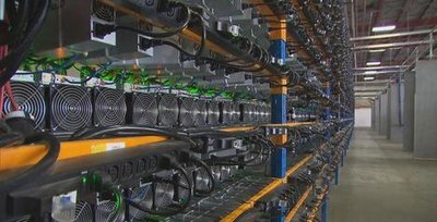 An overview of a bustling Canadian mining farm, showcasing various rigs and their role in profitable hosting