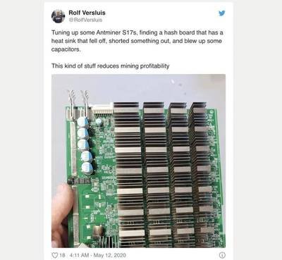 A close-up shot of a GPU mining rig with multiple graphics cards connected to a motherboard.